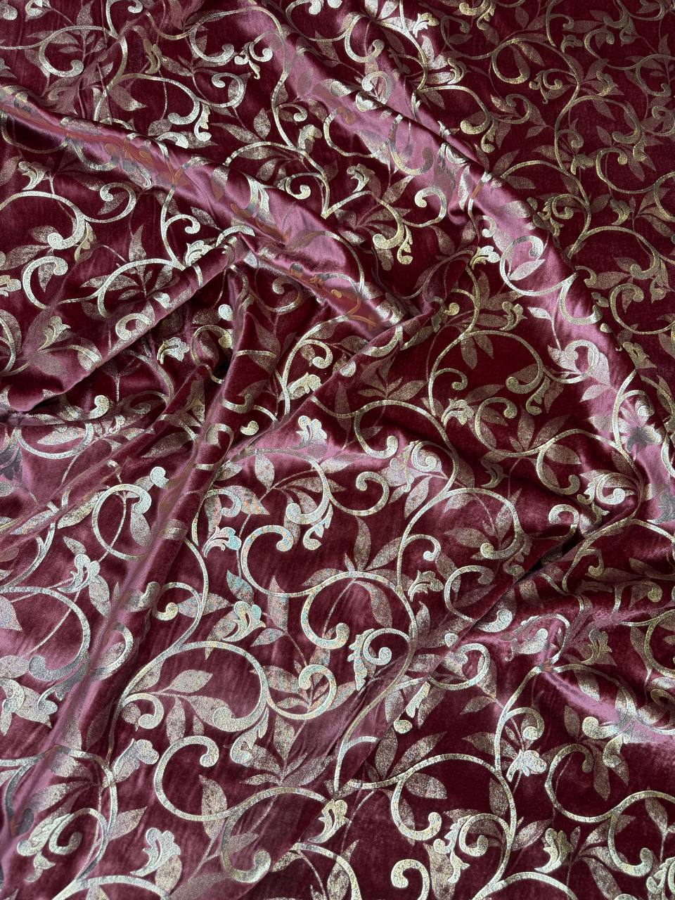 Burgundy Scroll fabric: scrolling vines in burgundy and pale metallic tones. Original fabric photograph.