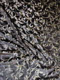 Midnight Scroll fabric: scrolling vines in midnight and pale metallic tones. Original fabric photograph.