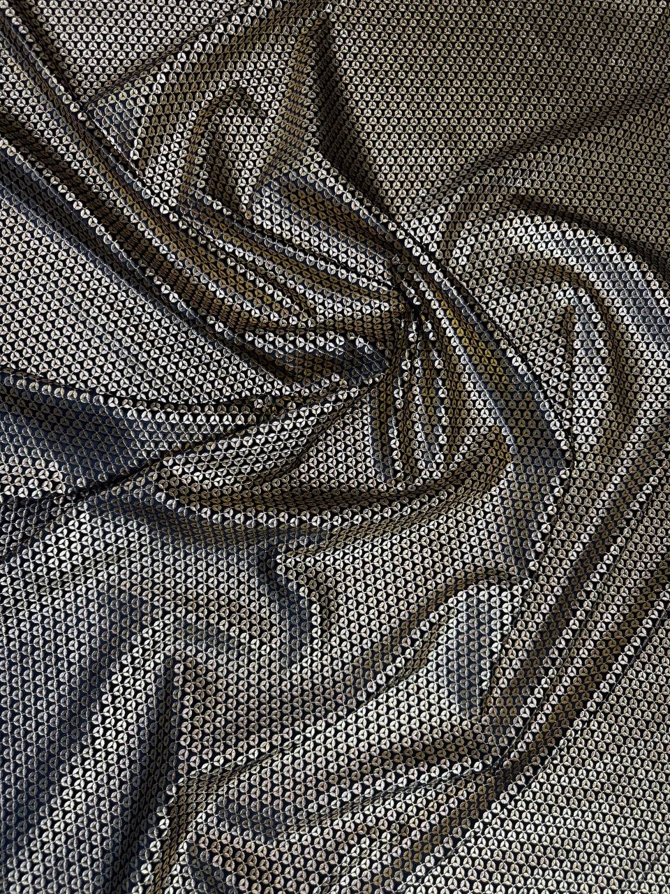 Metallic Micro Pattern fabric: small geometric repeat in dark ground and metallic tones. Original fabric photograph.