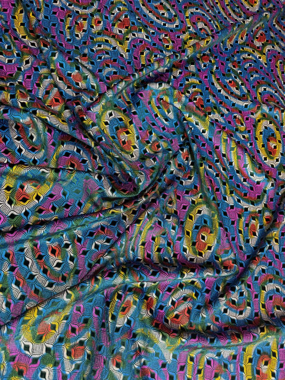 Multicolour Paisley fabric: paisley in multicolour: teal, pink, blue and yellow. Original fabric photograph.