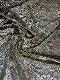 Sage Damask fabric: damask-inspired ornament in sage and silver tones. Original fabric photograph.