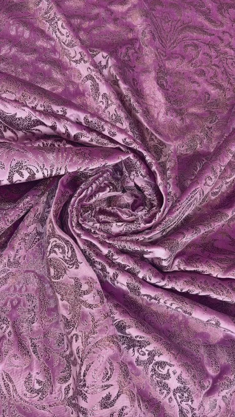 Original video showing amethyst damask fabric in movement, with tonal ornamental motifs.