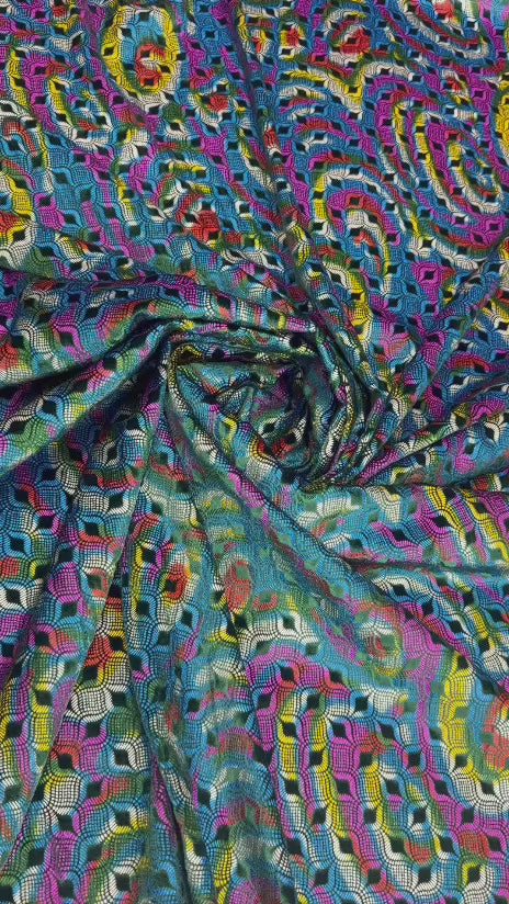 Original video showing multicolour paisley fabric in movement, with paisley.
