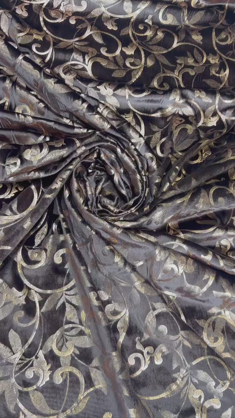 Original video showing midnight scroll fabric in movement, with scrolling vines.