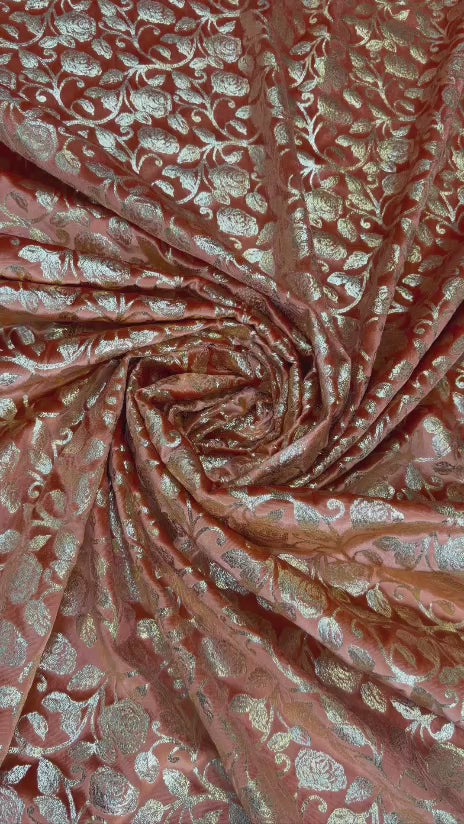 Original video showing terracotta leaf fabric in movement, with small botanical repeat.