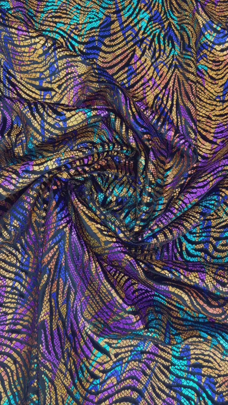 Original video showing jewel wave fabric in movement, with multicolour waves.